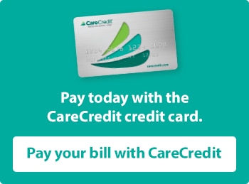 CareCredit credit card with text promoting bill payment options for dental services.